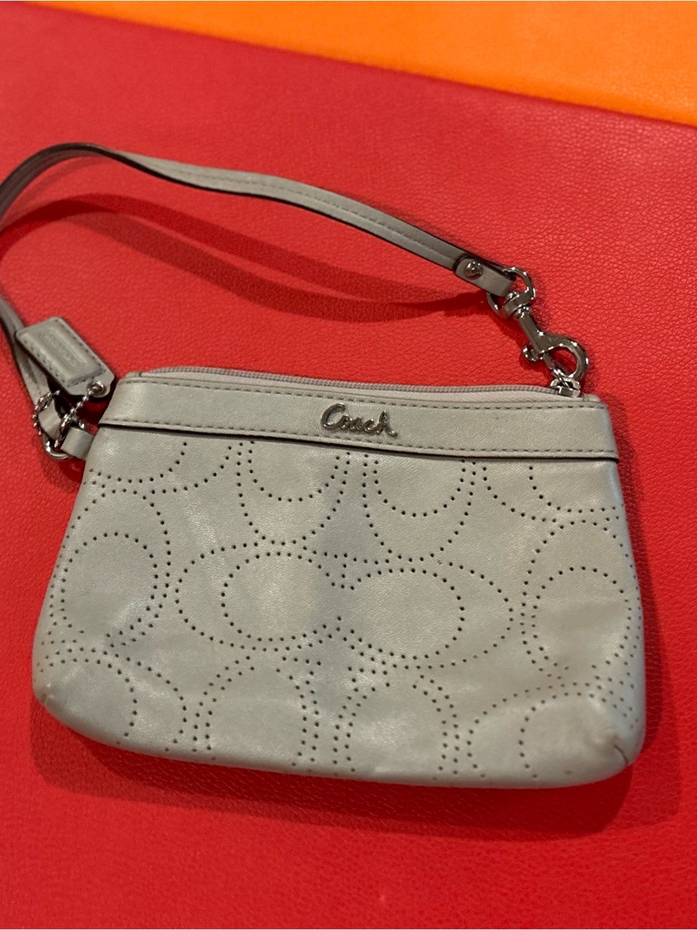 Coach Light Gray Perforated Leather Wristlet